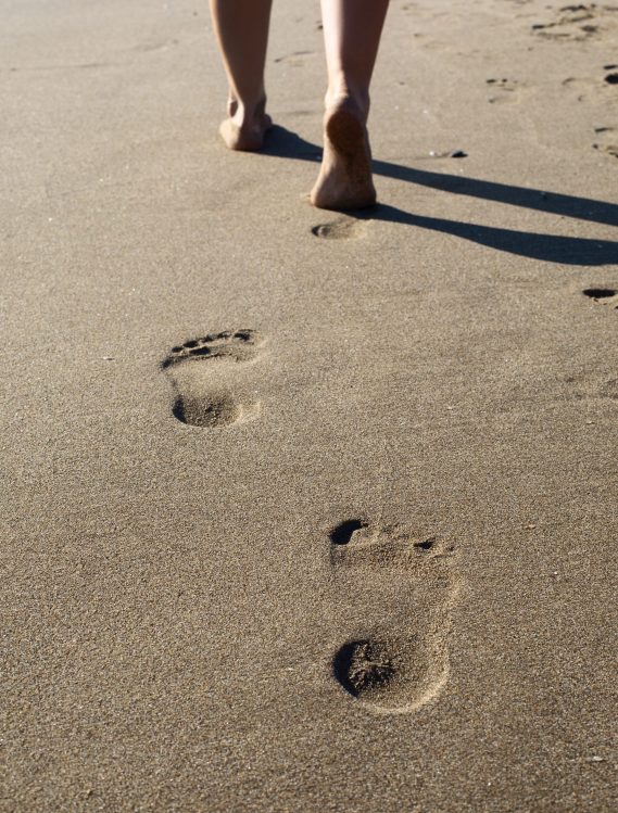 view-beach-sand-summertime-with-footprints view-beach-sand-summertime-with-footprints